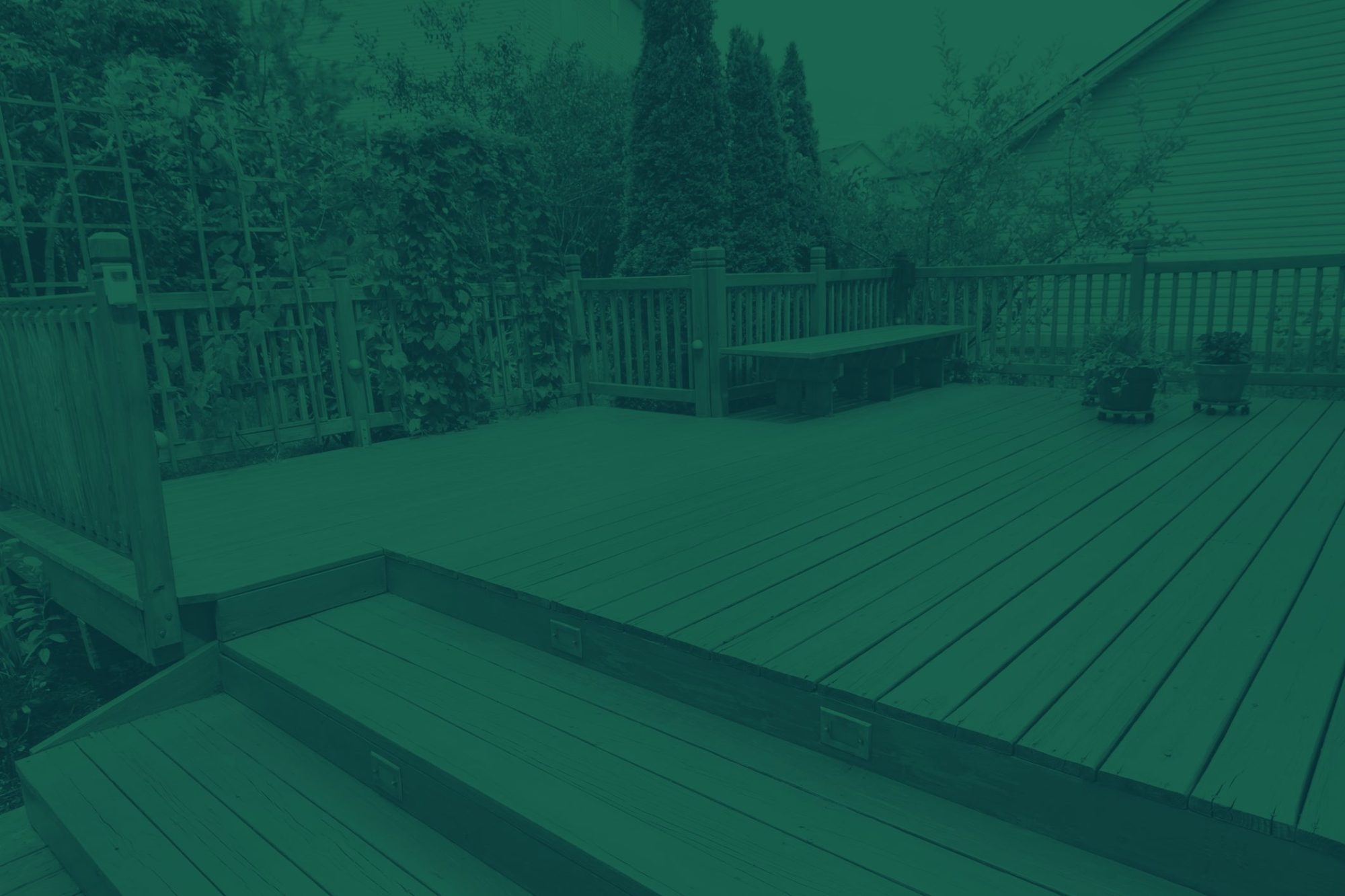 Wooden deck of family home at summer time.